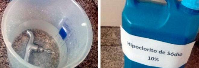 imagem de um torneira submersa em solução de hipoclorito de sódio 10%. Para ser bactericida  para  as  formas  vegetativas, deve-se deixar a torneira imersa por 30 min na solução.